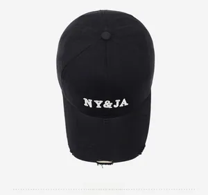Top view of black vintage cotton baseball cap with NY&JA embroidery and distressed brim