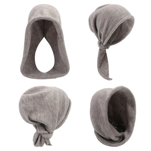 Detail of light brown knitted hooded scarf with tie-up straps from four different angles