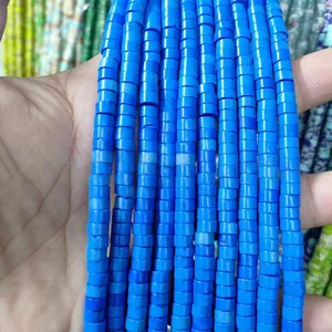 Macro shot of 3x6mm vibrant blue disc-shaped natural stone spacer beads for DIY jewelry