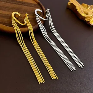 Elegant gold and silver long tassel ear bone clips set with sleek snake chain pendants