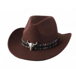 Detail of coffee cowboy hat with ethnic woven band and silver bull skull ornament