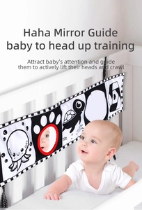 Detail of high-contrast baby soft book with safety mirror for tummy time training