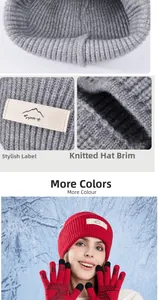 Detail of knitted winter balaclava hat with Sport label and touch screen gloves