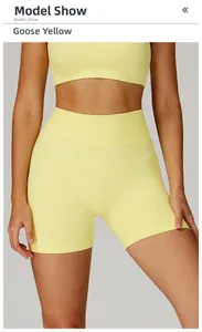 Détail du short de fitness sans couture à taille haute en tissu flexible jaune oie