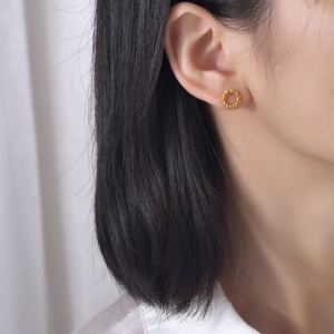Minimalist twisted rope gold hoop earrings for women made of durable titanium steel