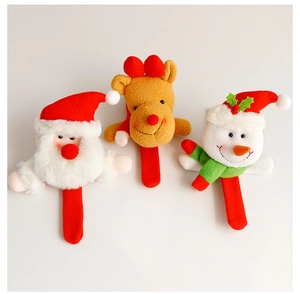 Close-up of three festive plush slap bracelets featuring Santa, elk, and snowman motifs