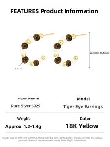 Detailed view of C-shaped S925 silver stud earrings with tiger eye beads and 18K gold finish