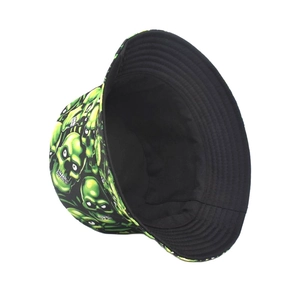 Detail view of reversible sun hat with green skull print and black inner lining fabric