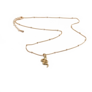 Golden snake pendant necklace with beaded chain and zircon eyes on white background