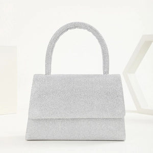 Elegant silver sequin evening bag with round handle for formal parties and weddings