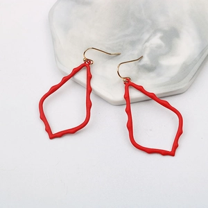Bright red minimalist water drop earrings with irregular textured wave pattern finish