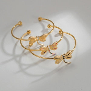 Minimalist 18K gold dragonfly cuff bracelets with sparkling zircon stone accents
