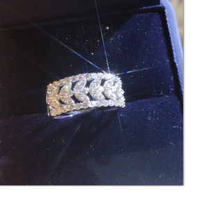 Luxury lace-edge sparkling multi-row diamond ring set in a premium navy blue jewelry box