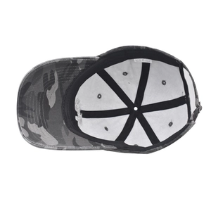 Detail view of cotton camo baseball cap interior showing black sweatband and stitching