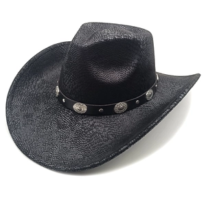 Detailed view of black cowboy hat with faux snake texture and silver metal studs