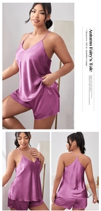 Detail of purple satin pajama set with V-neck camisole and matching elastic waist shorts