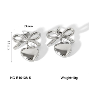 Detailed view of silver butterfly heart earrings showing 27mm height and 19mm width
