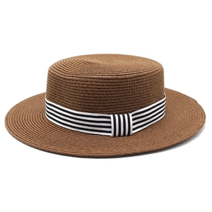Brown straw boater hat for women with black and white striped ribbon for summer beach