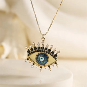 Collier en cuivre avec pendentif œil maléfique doré, centre bleu et zircons