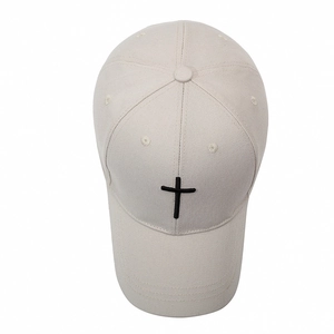 Beige cotton baseball cap with black cross embroidery and curved brim for men and women