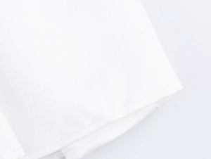 Close-up of white sweet floral set fabric texture showing fine horizontal stripes