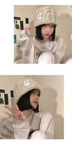 Close-up of beige cable knit beanie with side and front view of folded cuff and logo