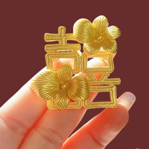 Matte gold Xi character flower brooch for women with elegant textured floral details