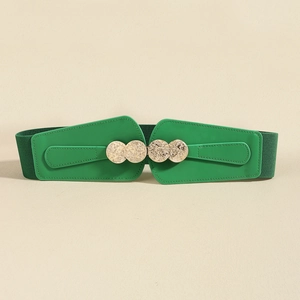 Detailed view of wide green elastic waist belt with textured gold double round buckle