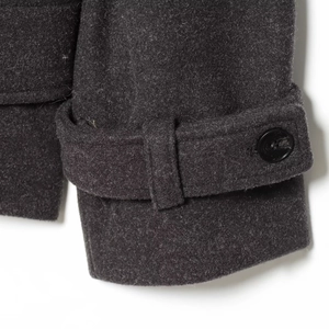 Women's British style grey wool blend coat featuring buckle straps and black buttons on cuffs