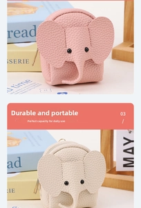 Detail of elephant coin purses in pink and beige lychee leather with zippers