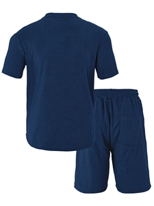 Detail view of navy blue waffle knit texture on men's summer t-shirt and shorts set