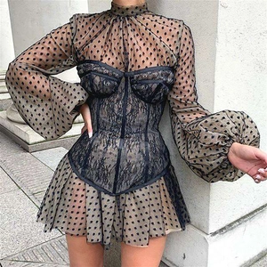 Elegant black mesh dress with lace patchwork, polka dot lantern sleeves and waist belt