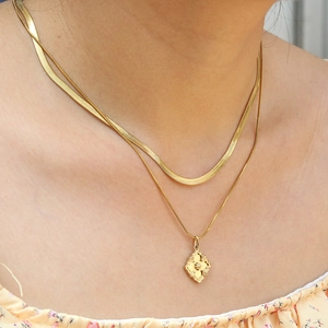 Elegant 18k gold plated double layer necklace set featuring a flat snake chain and pendant