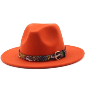 Detail of orange wool felt fedora featuring a snake pattern band and gold buckle