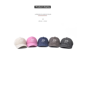 Collection of five washed cotton baseball caps with Paris embroidery in various colors
