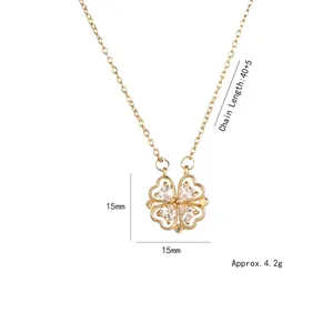 Gold-plated four-leaf clover heart magnetic necklace with sparkling zircons on white backdrop