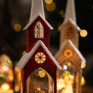 Christmas church style night light with miniature scenery and warm festive bokeh glow