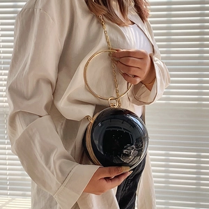 Fashionable acrylic round ball evening bag with gold ring handle and chain strap for women
