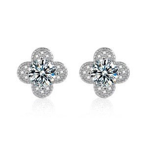 Detailed view of silver-tone clover stud earrings featuring white round-cut zircon stones
