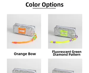 Detail view of large capacity pencil cases with orange bow and neon green diamond patterns