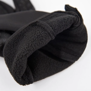 Close-up of black cycling glove featuring warm fleece lining and smooth outer fabric