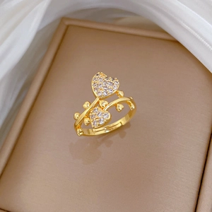 Elegant adjustable gold heart ring with pavé zircon stones and vine band