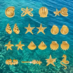 Golden starfish and seashell jewelry set displayed over rippling blue ocean water