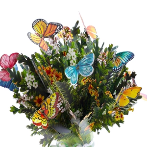 Detailed 3D pop-up flower bouquet card featuring vibrant paper butterflies and floral layers
