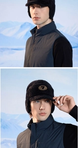 Detail of warm winter trapper hat with fur ear flaps and faux leather patch