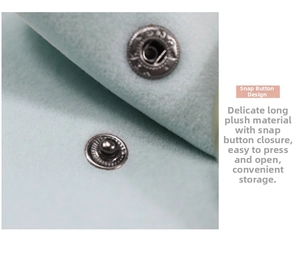 Detailed macro view of mint plush jewelry pouch showing metal snap button and soft fabric