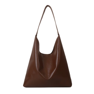 Retro brown leather large capacity tote bag and hobo shoulder bag for women on white background