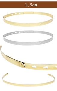 Detail view of 1.5cm metallic mirror belts in gold and silver with buckle adjustment