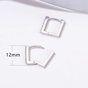 Detail showing 12mm square silver earrings with side-set crystal stones in a pair