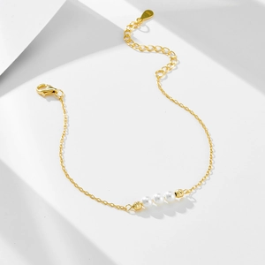 Elegant S925 sterling silver gold beaded bracelet featuring three white pearls